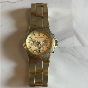 Michael Kors watch. New battery. Some scratches.